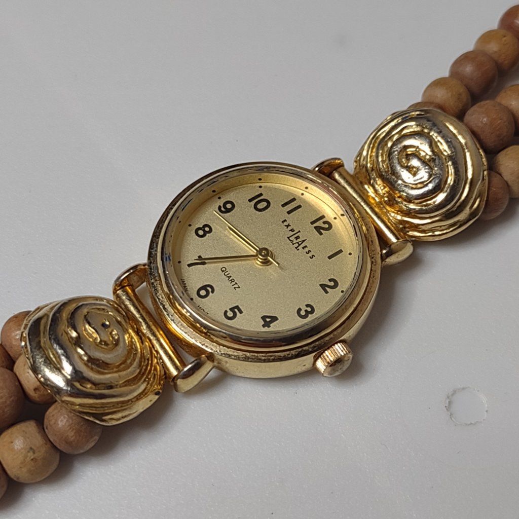 Gold Tone And Wood Bead Express Watch